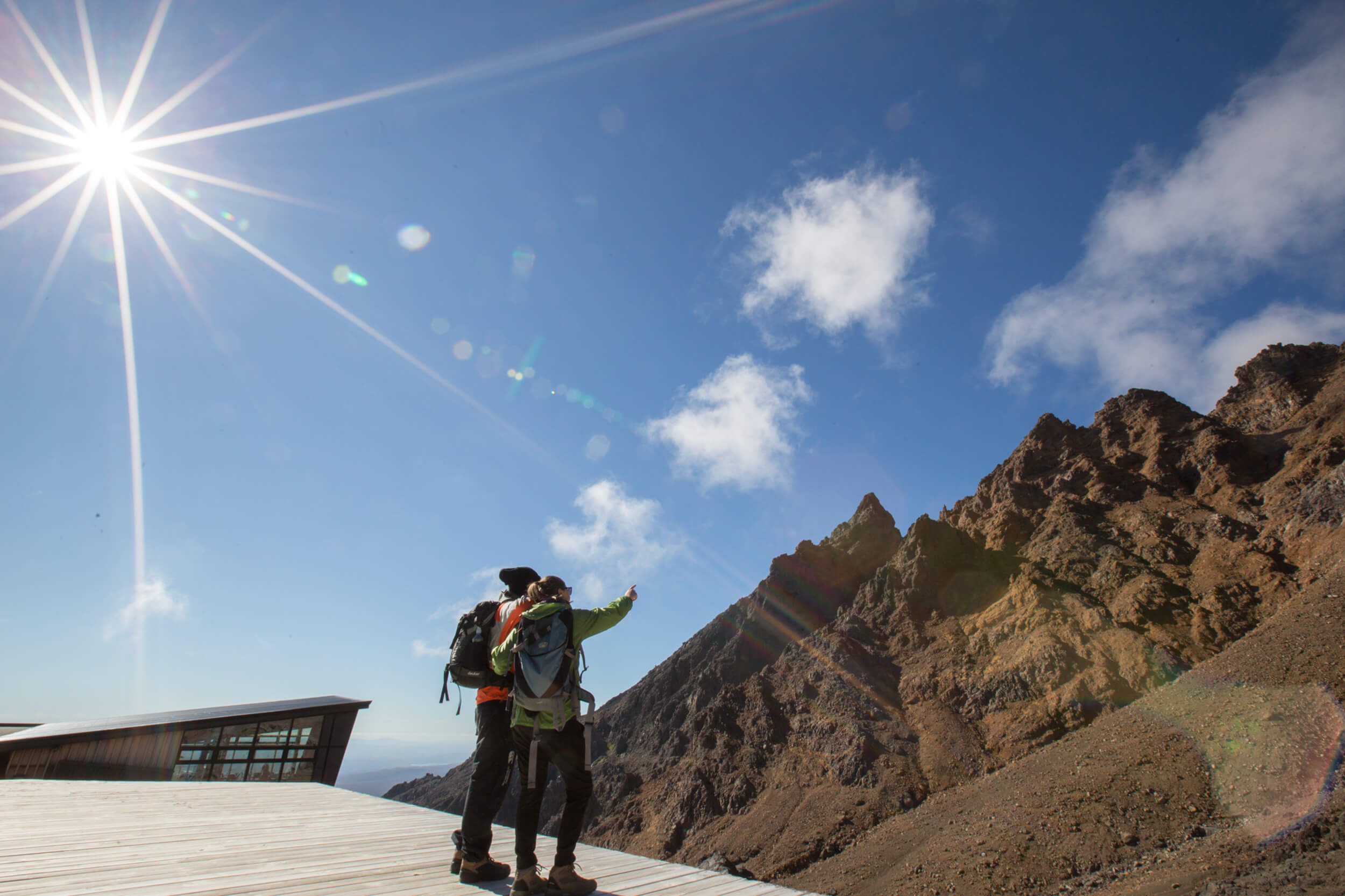 Couple getting ready to hike on Mt Ruapehu in the Summer - Visit Ruapehu.jpg